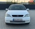 Белый Опель Астра, объемом двигателя 1.2 л и пробегом 319 тыс. км за 2499 $, фото 1 на Automoto.ua