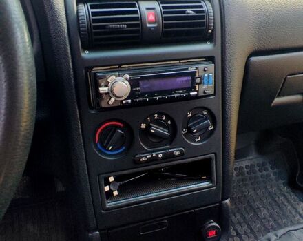 Белый Опель Астра, объемом двигателя 1.4 л и пробегом 274 тыс. км за 3100 $, фото 2 на Automoto.ua