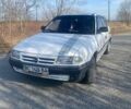 Белый Опель Астра, объемом двигателя 1.4 л и пробегом 248 тыс. км за 901 $, фото 1 на Automoto.ua