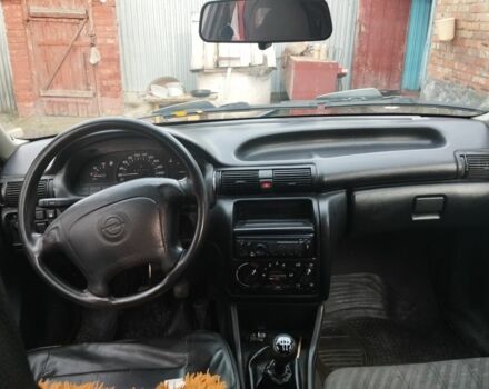 Белый Опель Астра, объемом двигателя 1.4 л и пробегом 250 тыс. км за 1400 $, фото 4 на Automoto.ua