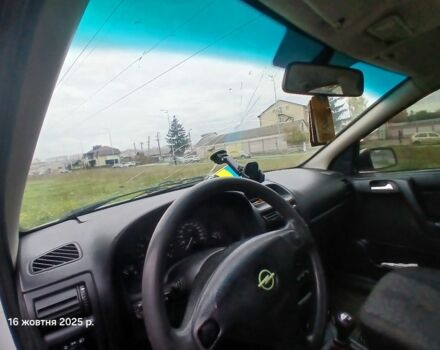 Білий Опель Астра, об'ємом двигуна 1.8 л та пробігом 301 тис. км за 950 $, фото 11 на Automoto.ua