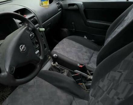 Белый Опель Астра, объемом двигателя 1.6 л и пробегом 226 тыс. км за 2500 $, фото 13 на Automoto.ua