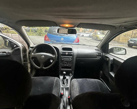 Белый Опель Астра, объемом двигателя 1.4 л и пробегом 285 тыс. км за 2321 $, фото 5 на Automoto.ua