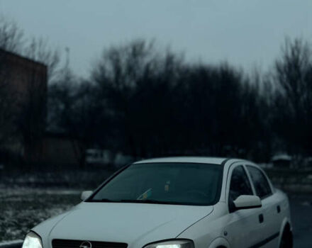 Белый Опель Астра, объемом двигателя 1.39 л и пробегом 340 тыс. км за 3650 $, фото 4 на Automoto.ua