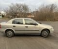 Белый Опель Астра, объемом двигателя 1.4 л и пробегом 260 тыс. км за 3200 $, фото 3 на Automoto.ua