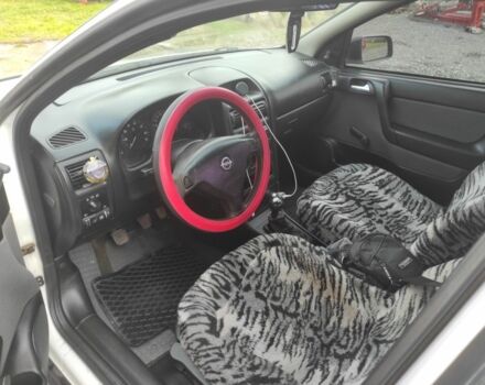 Белый Опель Астра, объемом двигателя 1.4 л и пробегом 216 тыс. км за 3650 $, фото 4 на Automoto.ua