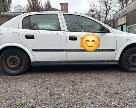 Белый Опель Астра, объемом двигателя 1.4 л и пробегом 304 тыс. км за 3500 $, фото 1 на Automoto.ua