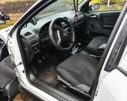 Белый Опель Астра, объемом двигателя 1.4 л и пробегом 248 тыс. км за 5000 $, фото 9 на Automoto.ua