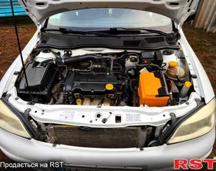 Білий Опель Астра, об'ємом двигуна 1.4 л та пробігом 248 тис. км за 5000 $, фото 4 на Automoto.ua