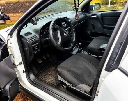 Білий Опель Астра, об'ємом двигуна 1.4 л та пробігом 248 тис. км за 5000 $, фото 9 на Automoto.ua