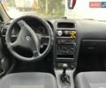 Білий Опель Астра, об'ємом двигуна 1.4 л та пробігом 320 тис. км за 2300 $, фото 8 на Automoto.ua