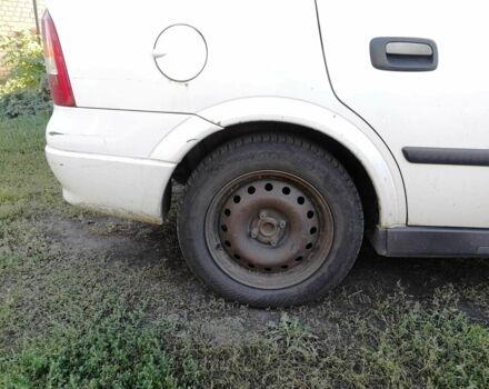 Белый Опель Астра, объемом двигателя 1.4 л и пробегом 370 тыс. км за 3484 $, фото 9 на Automoto.ua