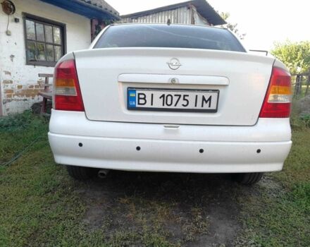 Белый Опель Астра, объемом двигателя 1.4 л и пробегом 370 тыс. км за 3484 $, фото 8 на Automoto.ua
