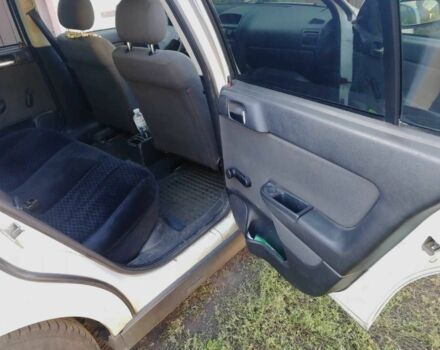 Белый Опель Астра, объемом двигателя 1.4 л и пробегом 370 тыс. км за 3484 $, фото 11 на Automoto.ua