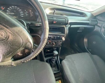 Белый Опель Астра, объемом двигателя 1.6 л и пробегом 140 тыс. км за 2300 $, фото 11 на Automoto.ua