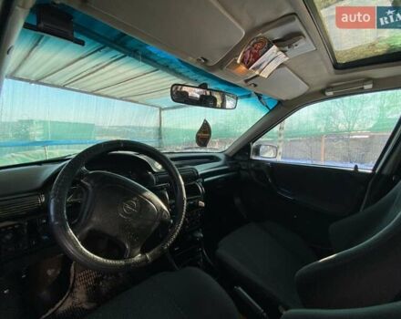 Белый Опель Астра, объемом двигателя 1.6 л и пробегом 140 тыс. км за 2300 $, фото 2 на Automoto.ua