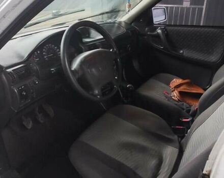 Белый Опель Астра, объемом двигателя 1.4 л и пробегом 245 тыс. км за 1900 $, фото 23 на Automoto.ua