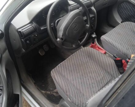 Белый Опель Астра, объемом двигателя 1.4 л и пробегом 2 тыс. км за 750 $, фото 5 на Automoto.ua