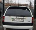 Білий Опель Астра, об'ємом двигуна 1.4 л та пробігом 245 тис. км за 1900 $, фото 1 на Automoto.ua