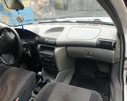 Белый Опель Астра, объемом двигателя 1.4 л и пробегом 290 тыс. км за 2100 $, фото 2 на Automoto.ua