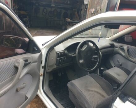 Белый Опель Астра, объемом двигателя 1.4 л и пробегом 290 тыс. км за 2100 $, фото 4 на Automoto.ua