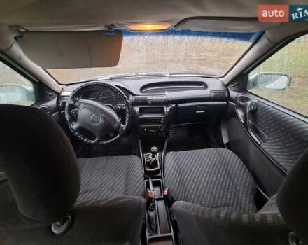 Білий Опель Астра, об'ємом двигуна 1.4 л та пробігом 240 тис. км за 1450 $, фото 8 на Automoto.ua