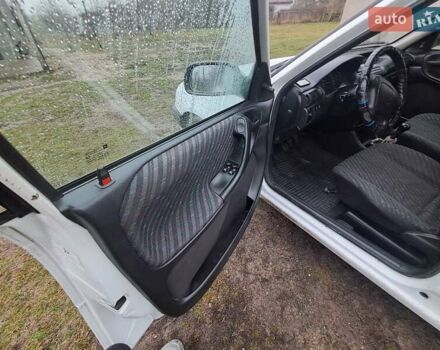 Білий Опель Астра, об'ємом двигуна 1.4 л та пробігом 240 тис. км за 1450 $, фото 11 на Automoto.ua