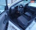 Белый Опель Астра, объемом двигателя 1.39 л и пробегом 250 тыс. км за 999 $, фото 2 на Automoto.ua