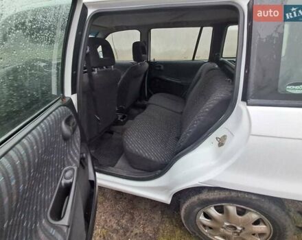 Білий Опель Астра, об'ємом двигуна 1.4 л та пробігом 240 тис. км за 1450 $, фото 7 на Automoto.ua