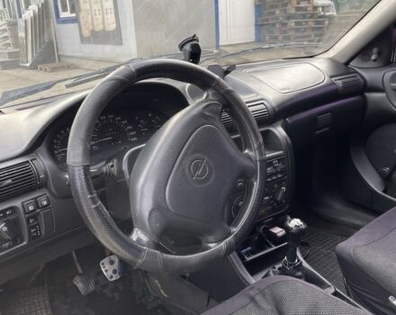 Белый Опель Астра, объемом двигателя 1.4 л и пробегом 335 тыс. км за 2250 $, фото 5 на Automoto.ua