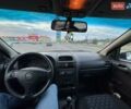 Белый Опель Астра, объемом двигателя 1.69 л и пробегом 290 тыс. км за 1350 $, фото 2 на Automoto.ua