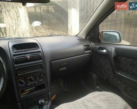 Белый Опель Астра, объемом двигателя 1.6 л и пробегом 336 тыс. км за 1950 $, фото 3 на Automoto.ua