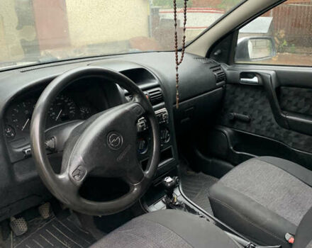 Белый Опель Астра, объемом двигателя 1.7 л и пробегом 400 тыс. км за 2400 $, фото 7 на Automoto.ua