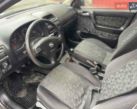 Белый Опель Астра, объемом двигателя 1.6 л и пробегом 250 тыс. км за 2900 $, фото 14 на Automoto.ua