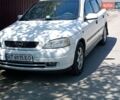 Белый Опель Астра, объемом двигателя 1.8 л и пробегом 270 тыс. км за 2459 $, фото 1 на Automoto.ua