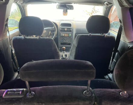 Белый Опель Астра, объемом двигателя 1.7 л и пробегом 300 тыс. км за 1650 $, фото 7 на Automoto.ua