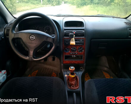 Белый Опель Астра, объемом двигателя 1.8 л и пробегом 250 тыс. км за 2500 $, фото 6 на Automoto.ua