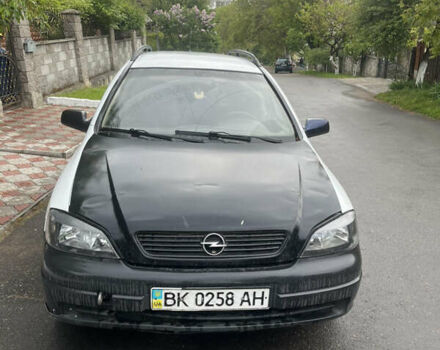 Белый Опель Астра, объемом двигателя 1.7 л и пробегом 300 тыс. км за 1650 $, фото 8 на Automoto.ua