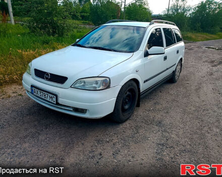 Белый Опель Астра, объемом двигателя 1.8 л и пробегом 250 тыс. км за 2500 $, фото 1 на Automoto.ua