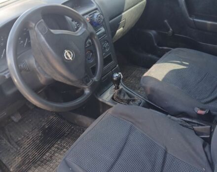 Белый Опель Астра, объемом двигателя 1.4 л и пробегом 200 тыс. км за 1700 $, фото 7 на Automoto.ua