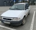 Белый Опель Астра, объемом двигателя 1.4 л и пробегом 350 тыс. км за 1350 $, фото 1 на Automoto.ua