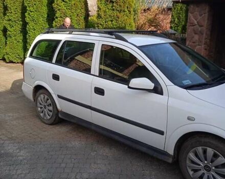 Белый Опель Астра, объемом двигателя 1.4 л и пробегом 251 тыс. км за 3000 $, фото 2 на Automoto.ua