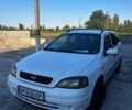 Белый Опель Астра, объемом двигателя 2 л и пробегом 323 тыс. км за 1400 $, фото 1 на Automoto.ua