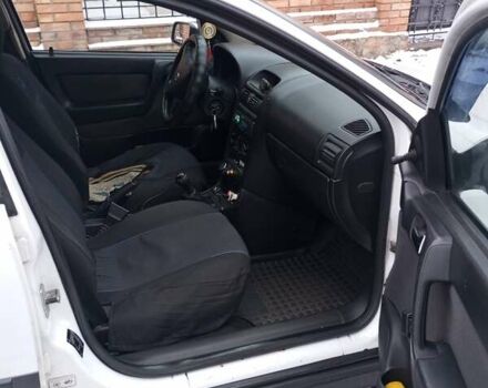 Белый Опель Астра, объемом двигателя 1.6 л и пробегом 324 тыс. км за 2800 $, фото 6 на Automoto.ua