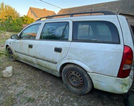 Белый Опель Астра, объемом двигателя 2 л и пробегом 250 тыс. км за 399 $, фото 3 на Automoto.ua