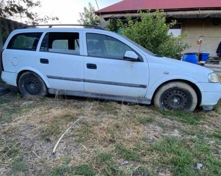 Белый Опель Астра, объемом двигателя 2 л и пробегом 250 тыс. км за 399 $, фото 1 на Automoto.ua