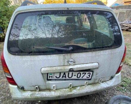 Белый Опель Астра, объемом двигателя 2 л и пробегом 250 тыс. км за 399 $, фото 2 на Automoto.ua