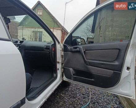 Белый Опель Астра, объемом двигателя 1.4 л и пробегом 327 тыс. км за 2300 $, фото 5 на Automoto.ua