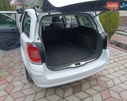 Белый Опель Астра, объемом двигателя 1.9 л и пробегом 210 тыс. км за 3850 $, фото 12 на Automoto.ua