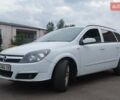 Белый Опель Астра, объемом двигателя 1.91 л и пробегом 368 тыс. км за 4670 $, фото 2 на Automoto.ua